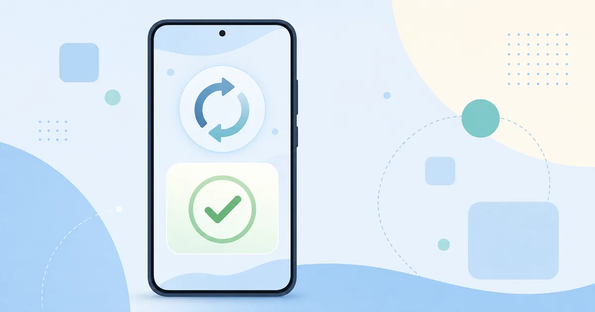スマートフォンの画面に表示されたアップデート通知アイコンとチェックマーク